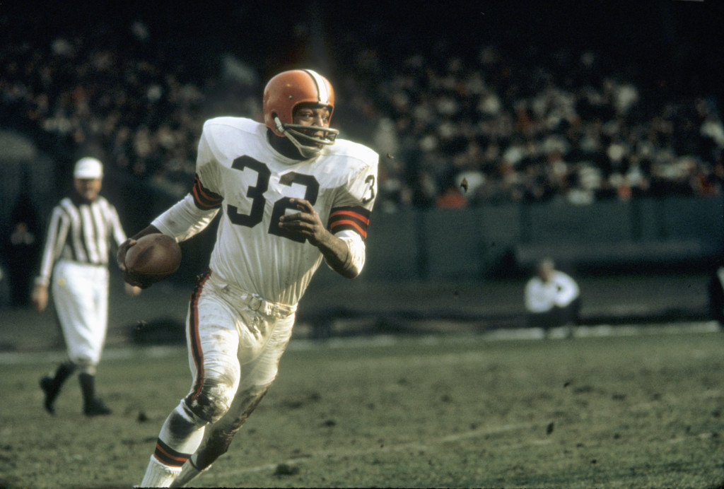 CLEVELAND, OH - 1960: Runningback Jim Brown #32 of the Cleveland Browns runs with the ball during a game in the 1960's at Municipal Stadium in Cleveland, Ohio. (Photo by: Tony Tomsic/Getty Images)