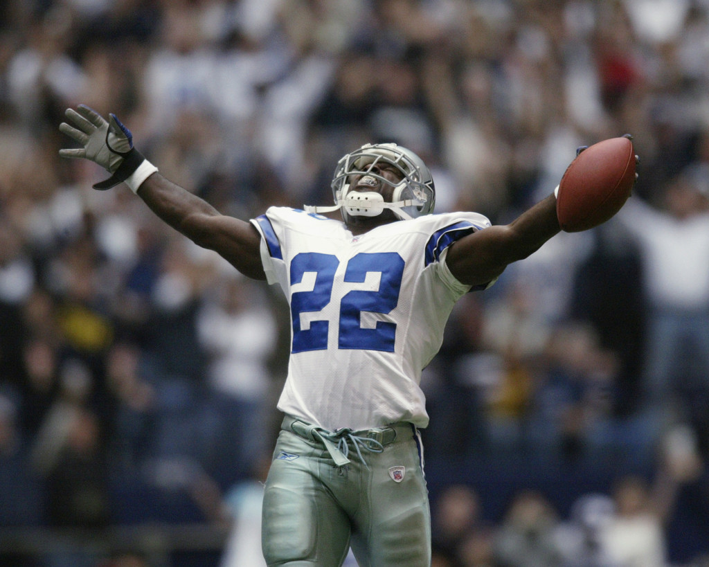 IRVING, TX - OCTOBER 27: Running Back Emmitt Smith #22 of the Dallas Cowboys celebrates beating the NFL rushing record during the NFL game against the Seattle Seahawks at Texas Stadium on October 27, 2002 in Irving, Texas. The Seahawks defeated the Cowboys 17-14. (Photo by Ronald Martinez/Getty Images)